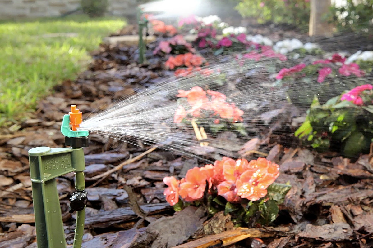 Mister Landscaper locking collar securing the micro-spray connection for stability.