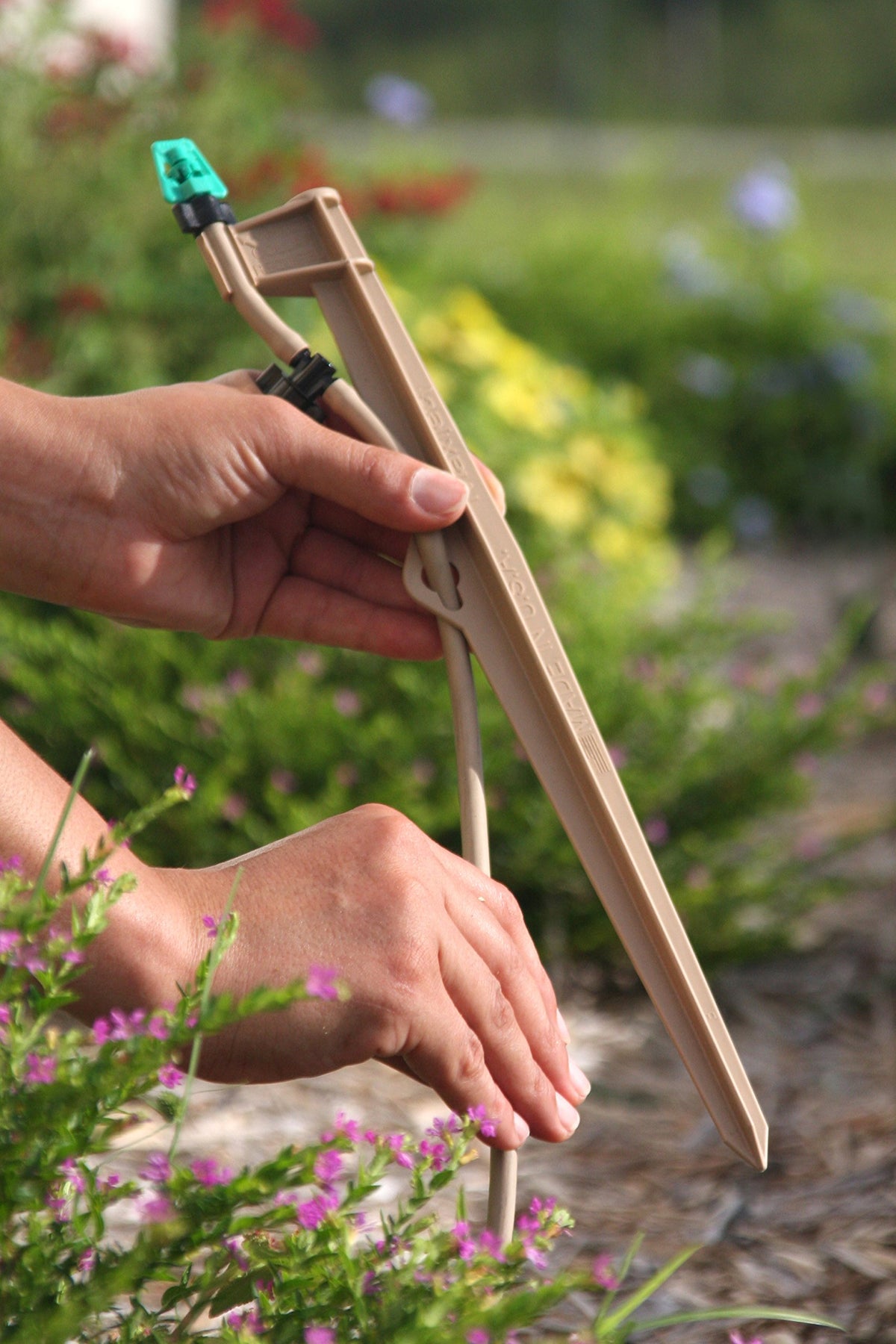 Mister Landscaper Tan Landscape Stake Assembly 27in vinyl tubing supports flexible, tidy line routing.