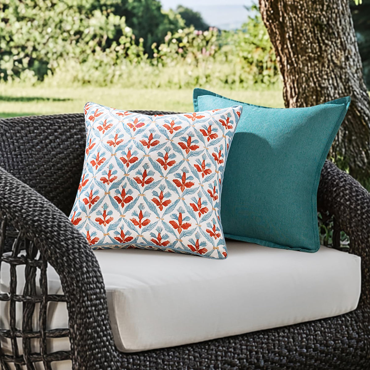 MIULEE blue-rust floral pillow cover adds boho charm to garden seating.