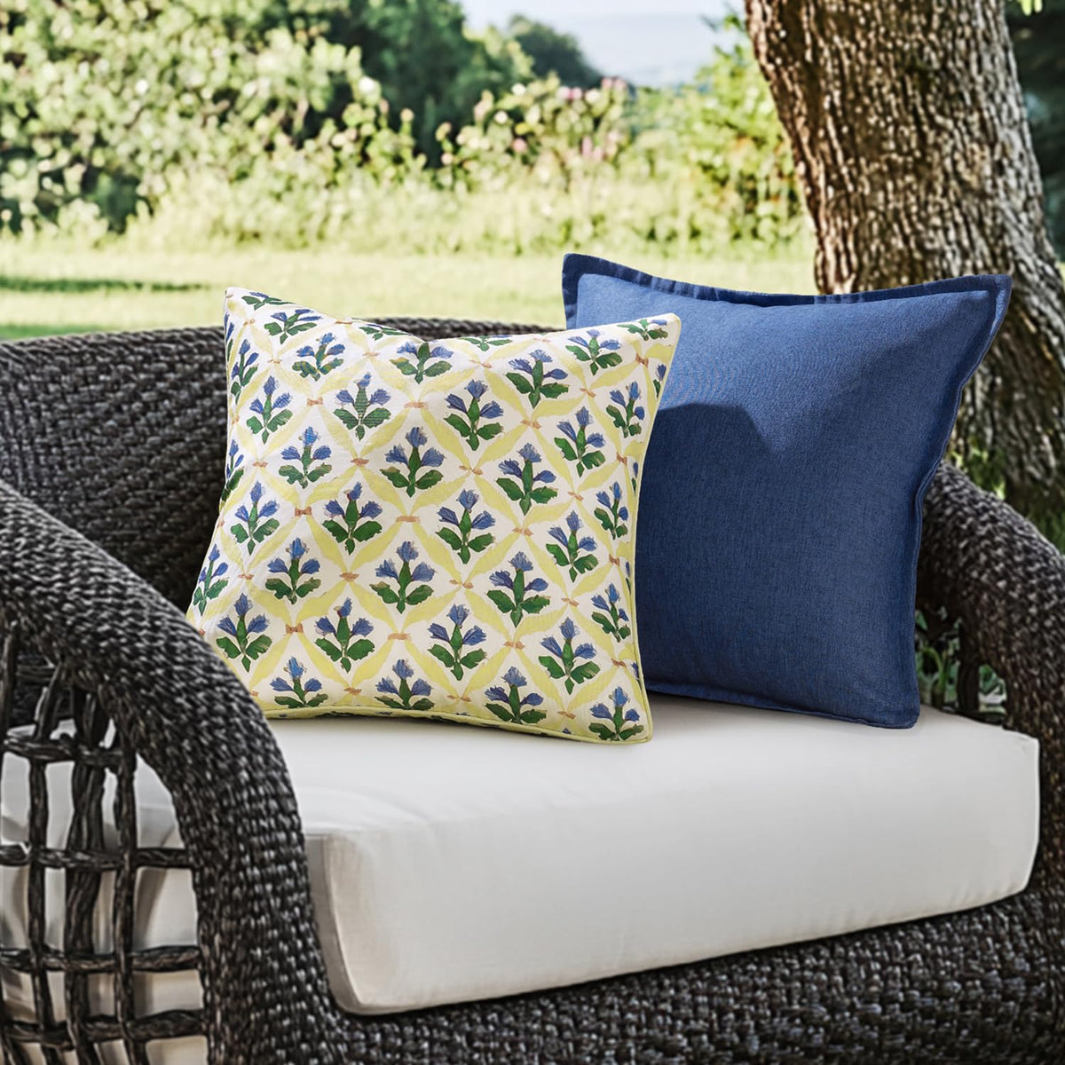 MIULEE pillow cover showcases vibrant yellow and blue florals for patio style.