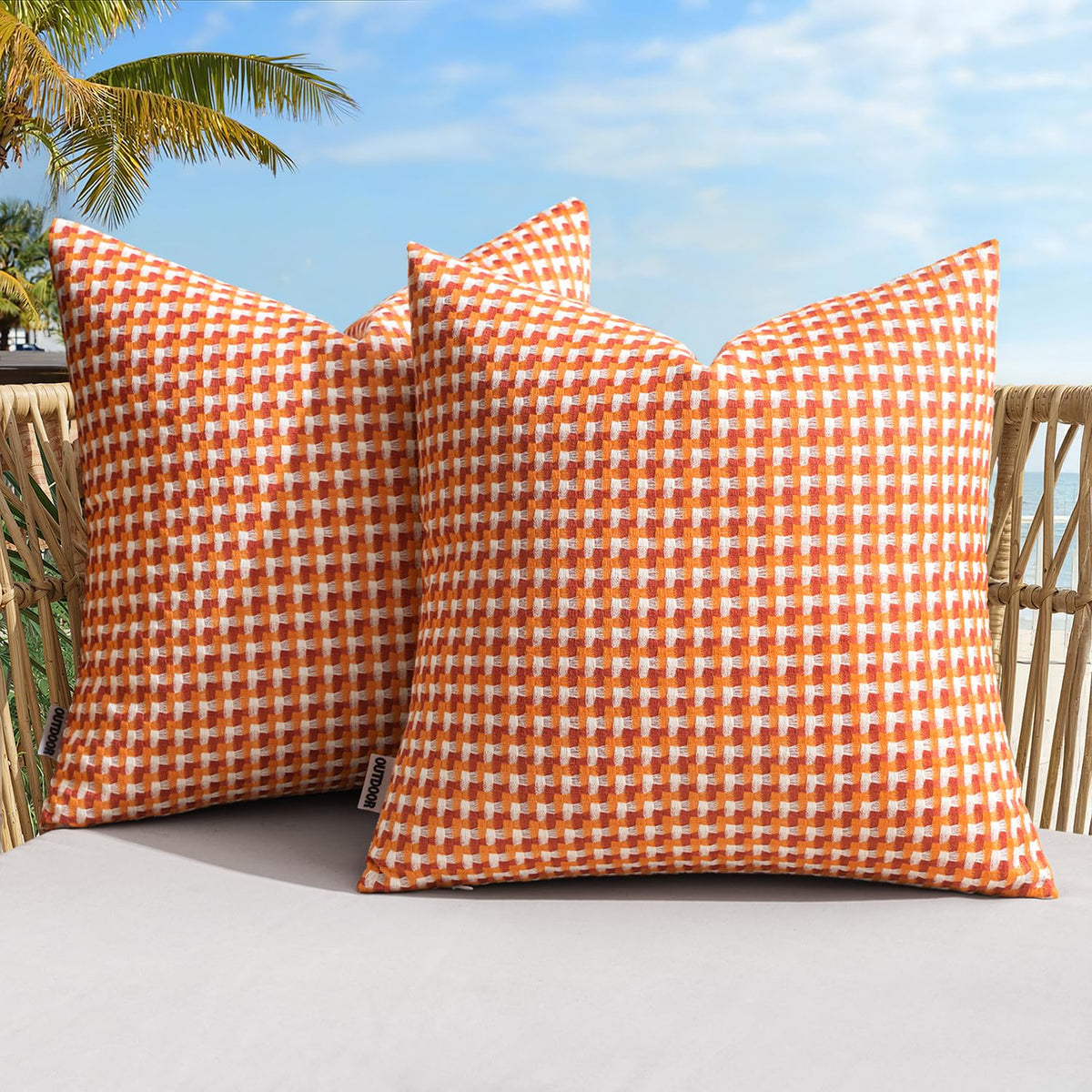 MIULEE outdoor texture pillow cover in orange enhances patio seating with cozy warmth