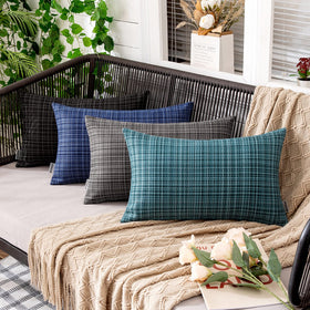 MIULEE navy pillow cover on a couch for easy indoor decor refresh.