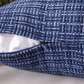 MIULEE navy pillow cover shown in outdoor tent setting for versatile use.