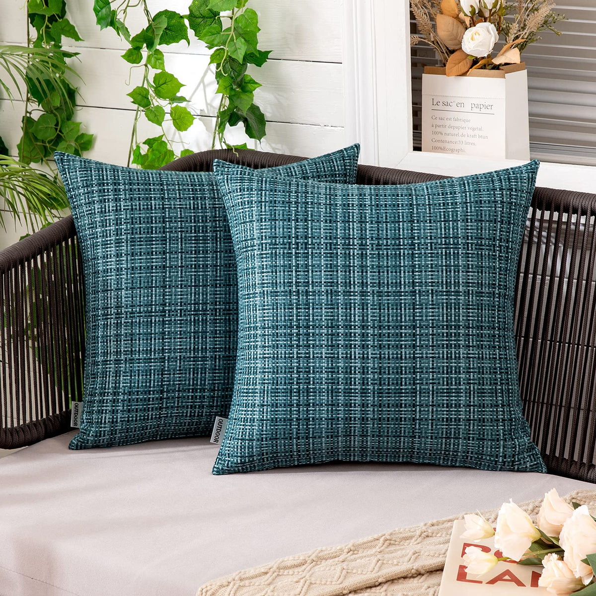 MIULEE outdoor pillow cover teal on patio protects cushions from splashes with water-resistant coating.