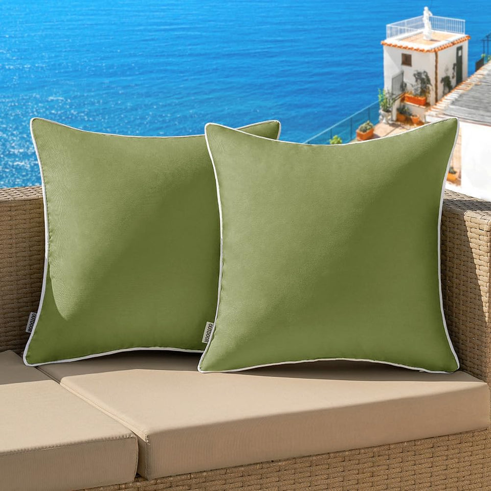 MIULEE sage green outdoor pillow cover two-pack on a couch for patio decor