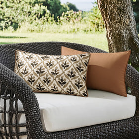 MIULEE waterproof canvas pillow cover for patios keeps cushions dry during showers.