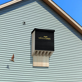 MIXXIDEA outdoor bat house mounted on a tree ready for roosting