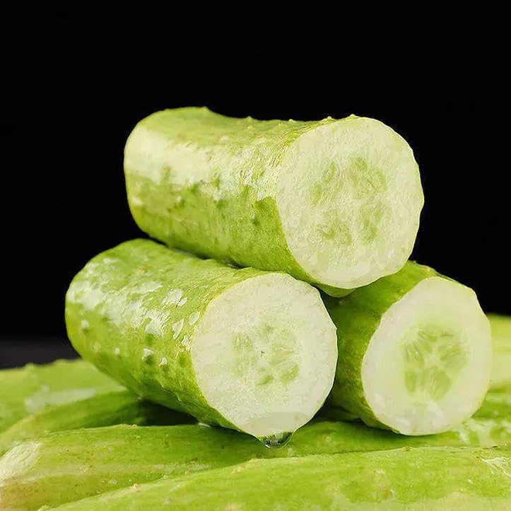 Mixrug White Jade cucumber plants in a garden illustrate home growing success