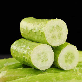 Mixrug White Jade cucumber plants in a garden illustrate home growing success