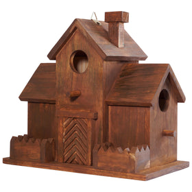 MIXUMON Rustic castle design bird house in a garden setting