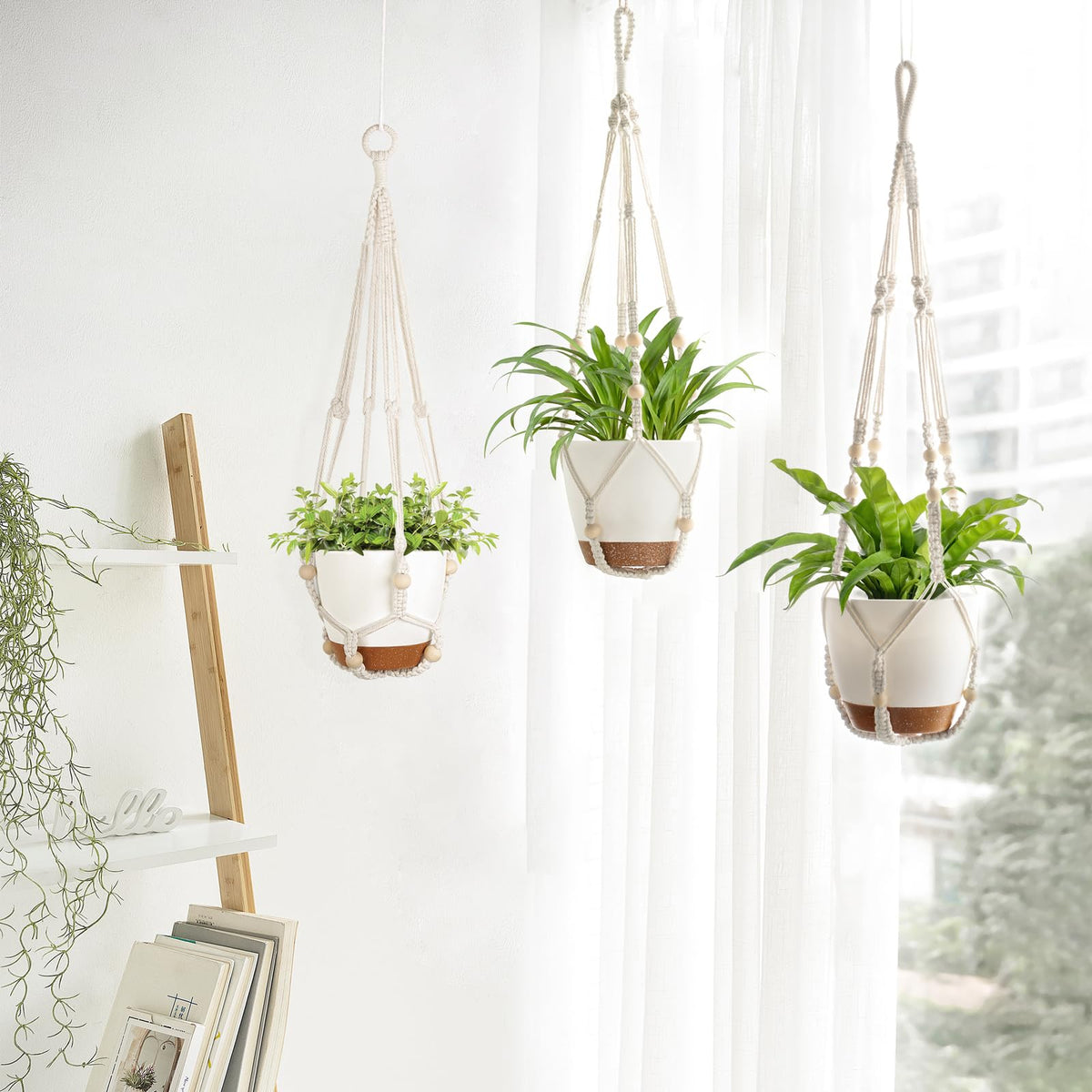 Mkono 29 inch macrame hanger with lush plant decor example