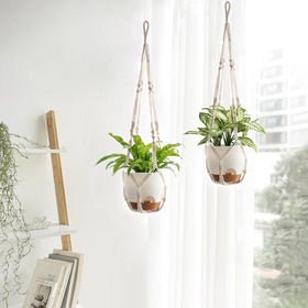 Detachable pot with snap buckle on Mkono planter for easy cleaning.