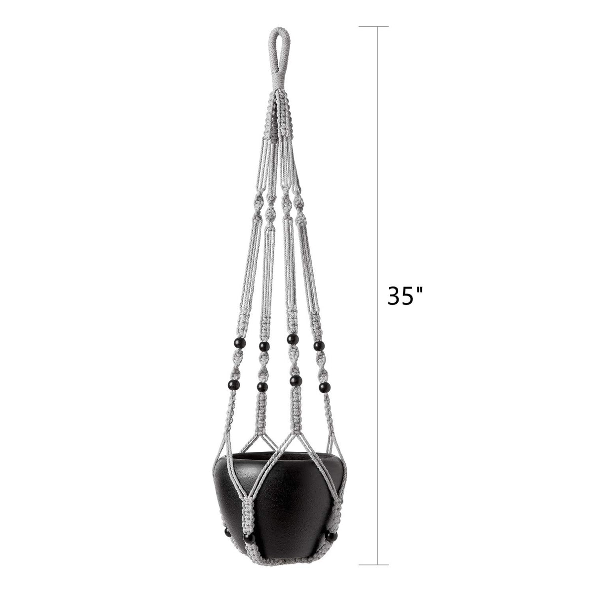Grey Mkono hanger with wood beads enhances boho home decor.