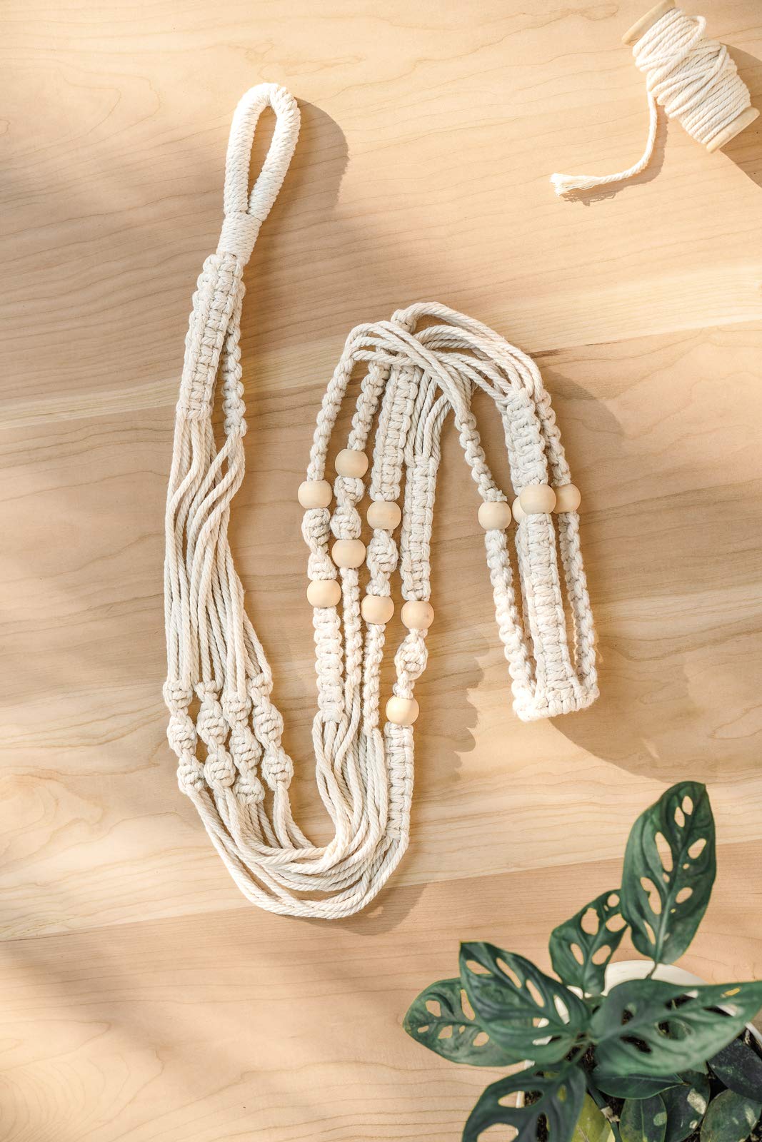 Mkono handmade cotton macrame plant holder emphasizes craftsmanship and texture