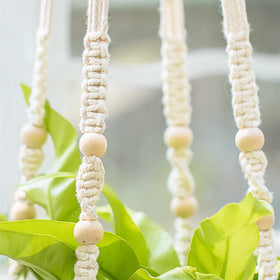 Mkono indoor-outdoor boho plant hanger complements balcony and living room styling