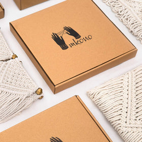 Mkono ivory macrame hanger fits planters up to 7 inches diameter.