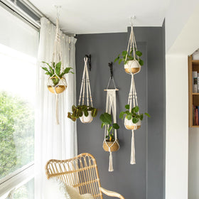 Mkono ivory macrame hanger with four different lengths for variety.