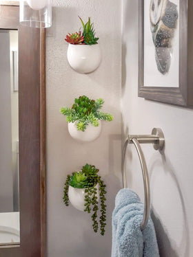 Mkono minimalist wall planter set showcases artificial greens for modern interiors.