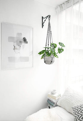 Set of two Mkono hangers styled together for flexible display.