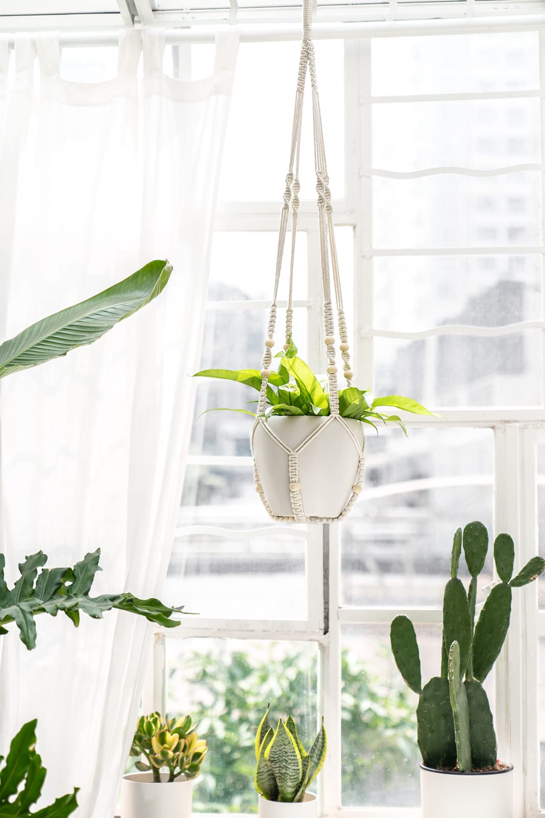 Mkono tassels-free design hanger for minimalist spaces with simple elegance