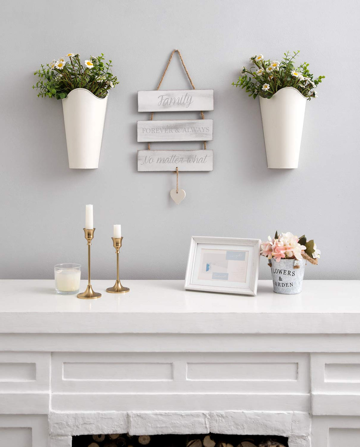 Mkono wall vase with antique finish designed to hang above a headboard.