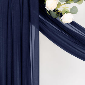 MLMC ceremony backdrop framing portraits with airy, romantic drape.