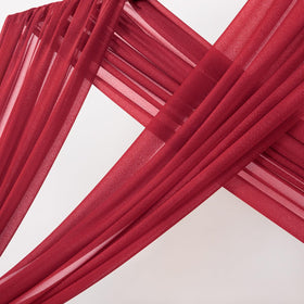 MLMC red backdrop curtains measure 20 feet long for large events.