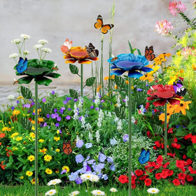 Mocety bee watering station with blue flower design creates a refreshing yard focal point.