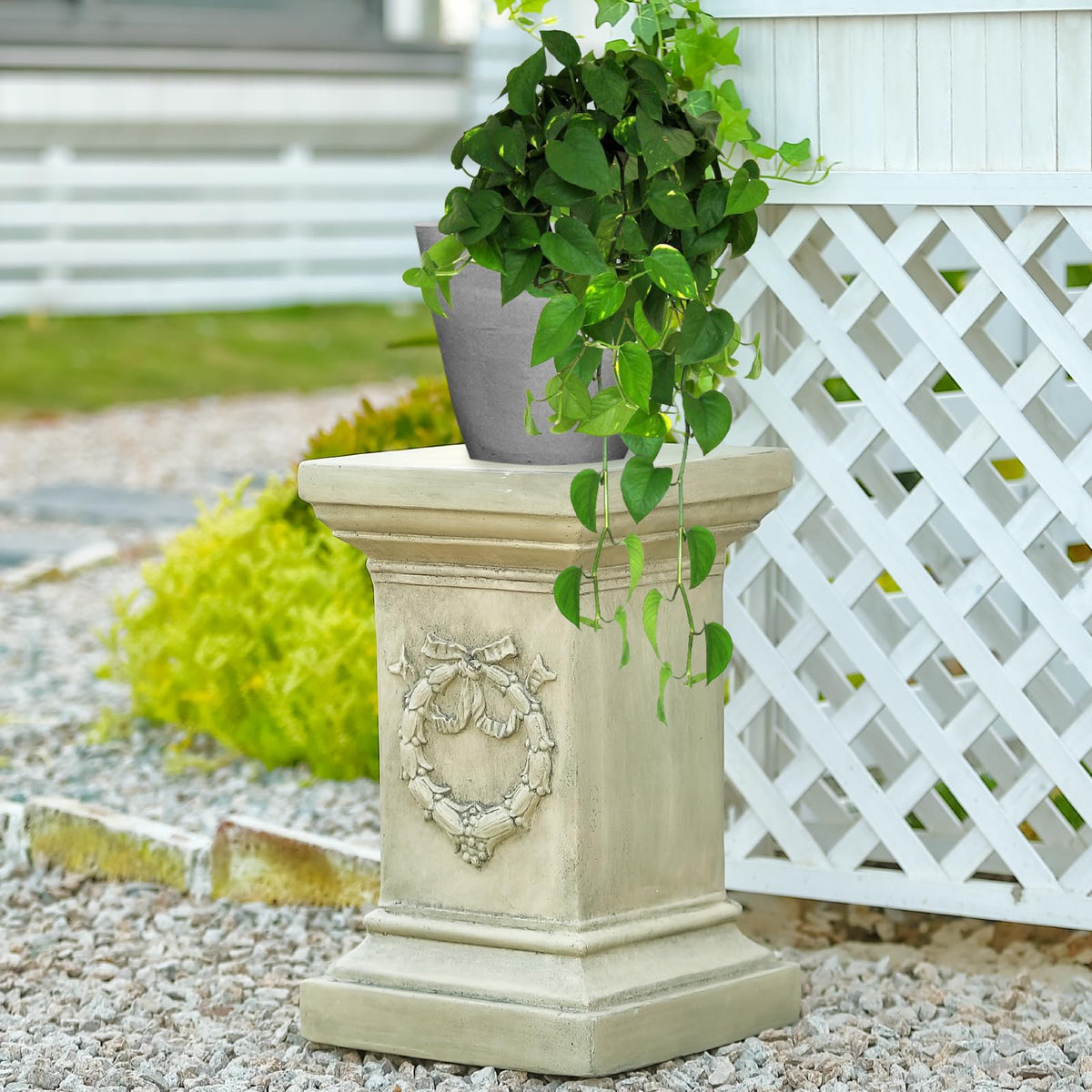 MOCOME pedestal pairs with statues, pots, and garden decor with ease.