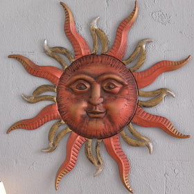 MOCOME sun face metal art with a bright smile enhances indoor ambiance.
