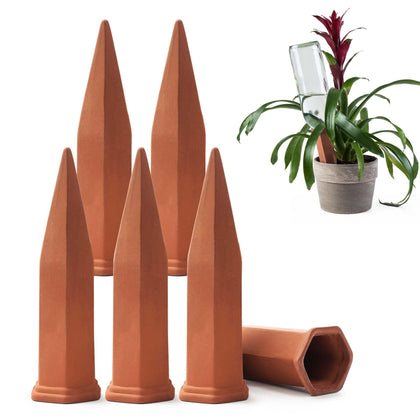 Modern Innovations ceramic terracotta self-watering spike beside a thriving plant for steady moisture