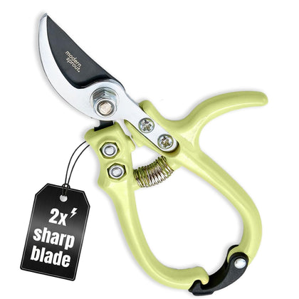 Modern Sprout hand pruner with chartreuse bypass blade for precise cuts.