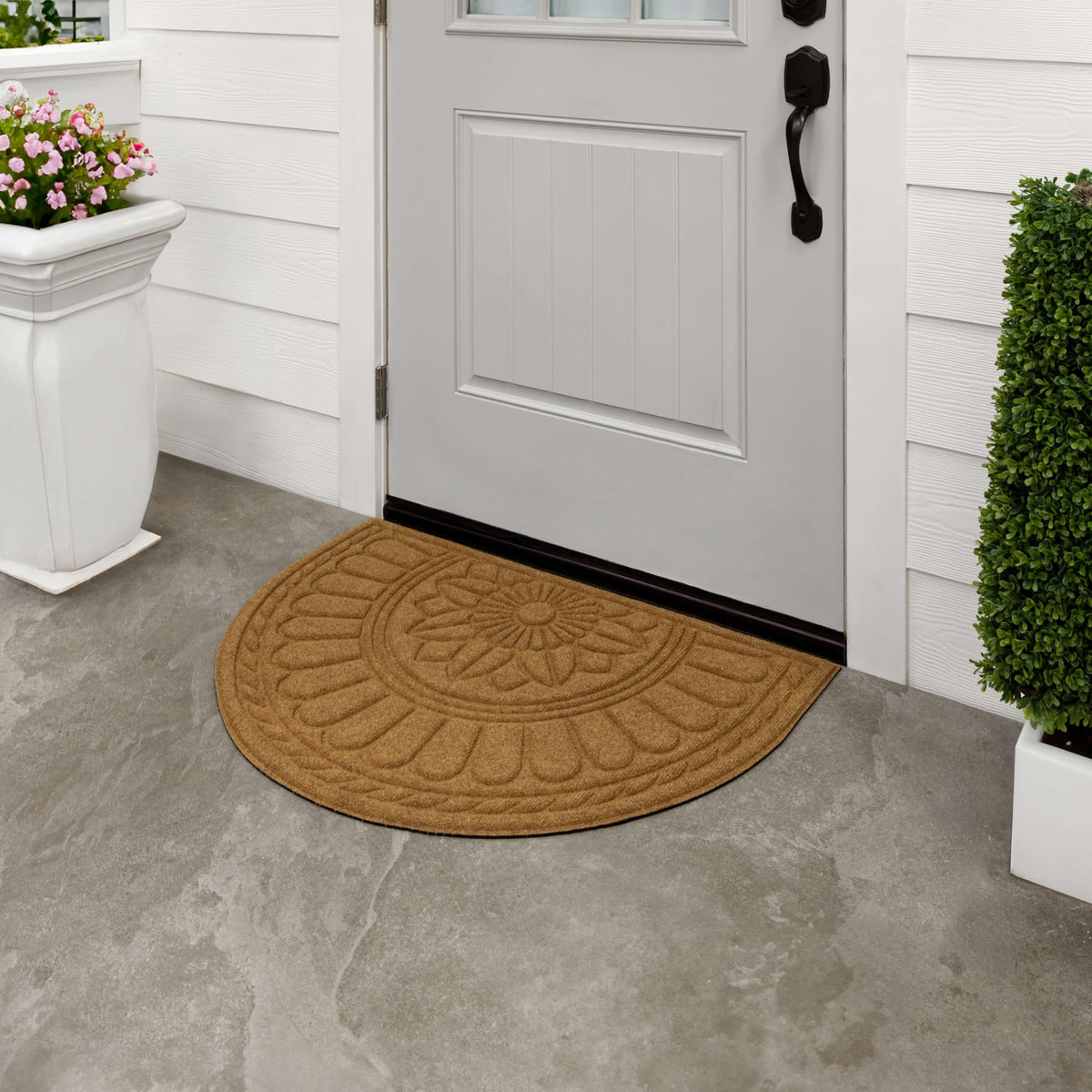 Mohawk Home low-profile mat sits flush with door threshold.