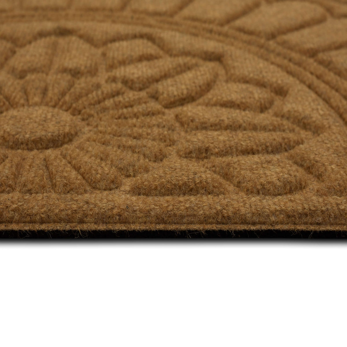 Mohawk Home recycled rubber backing supports durable outdoor use.
