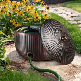 Monarch Abode garden hose holder accommodates up to 100 ft hoses for outdoor use.