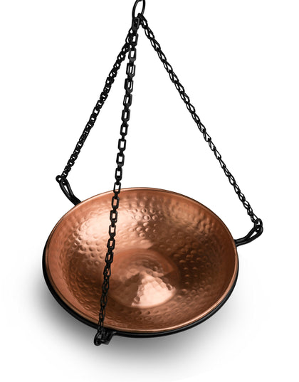 Monarch Abode hanging copper bird bath with hand-hammered finish attracts birds to drink and bathe.
