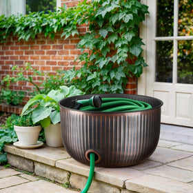 Monarch Abode non-slip feet protect surfaces while moving the hose organizer.