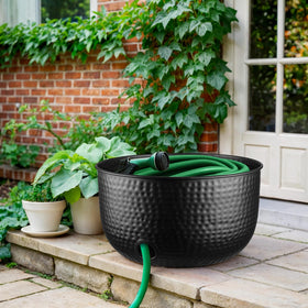 Non-slip feet protect surfaces when using Monarch Abode hose storage.