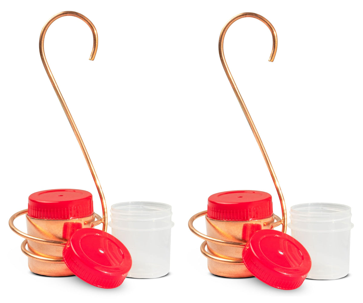 Monarch Abode pure copper hummingbird feeder with elegant hanging design for outdoors; resists rust.