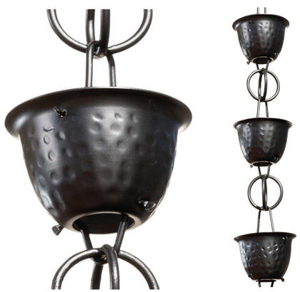 Monarch Rain Chains aluminum hammered cup black rain chain displayed outdoors as a gutter alternative.