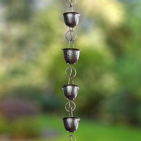 Expandable hanger system from Monarch Rain Chains demonstrating customizable length for rooflines.