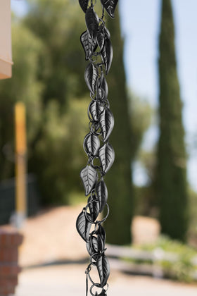 Monarch Rain Chains in matte black finish adding a modern outdoor feature with durable performance