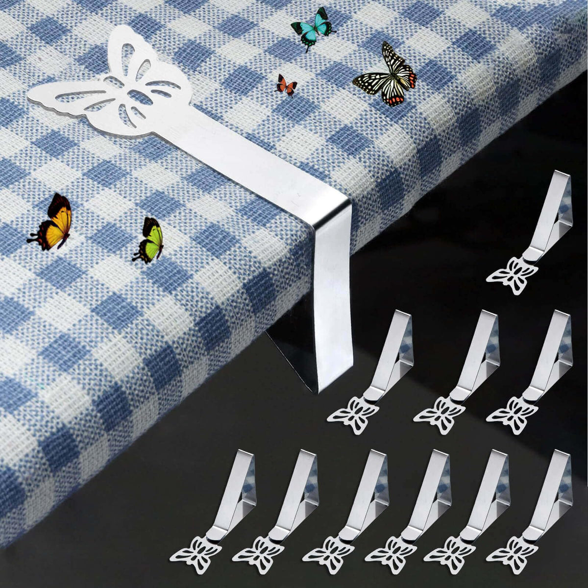 MONNCHA butterfly tablecloth clip in use secures a cloth on a windy outdoor table