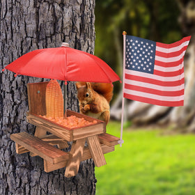 Mont Pleasant Pine Wood Squirrel Feeder remains durable outdoors while blending with garden scenery.