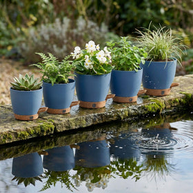 Montresor ocean blue perforated inner pot promotes airflow and healthy roots.