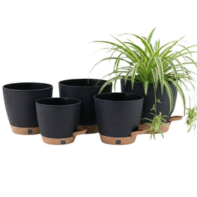 Montresor self-watering pots front view with sleek matte black finish for easy moisture management.