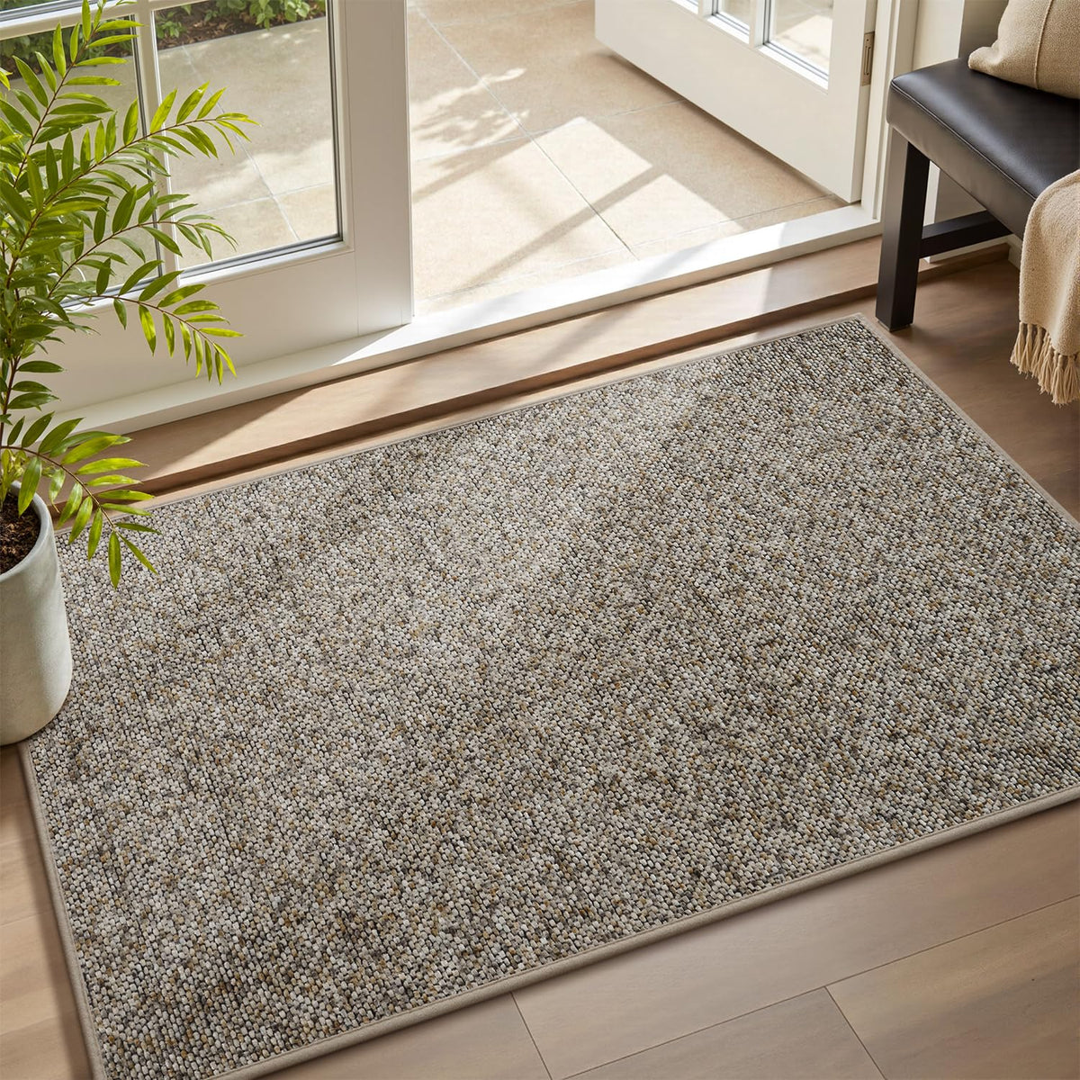 MontVoo door mat with absorbent scraper-top traps moisture and dirt at the entry.
