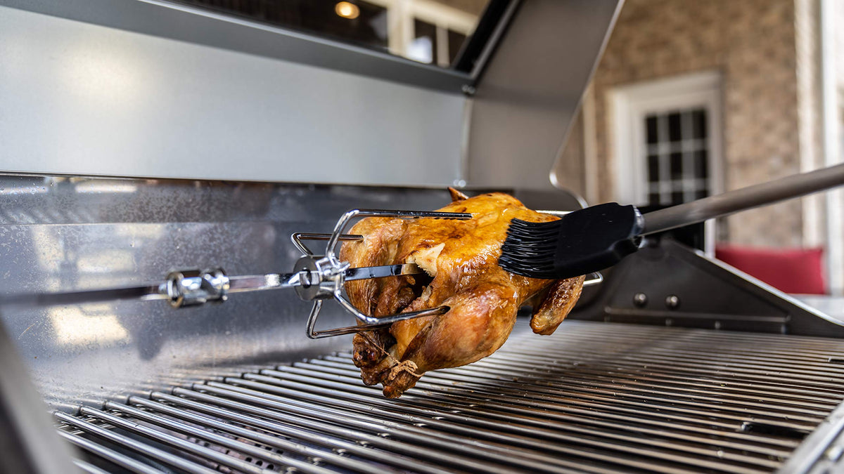 Versatility: rotisserie cooking of poultry, roasts, and vegetables outdoors