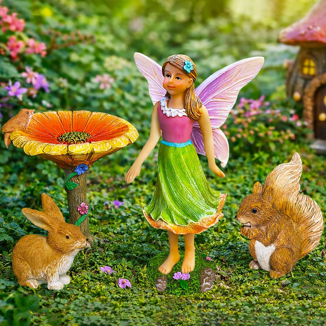 Mood Lab fairy garden figurines featuring flower accents in a display