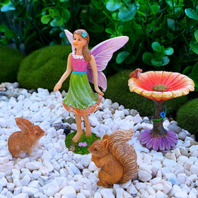 Mood Lab indoor display setup featuring fairy garden figurines